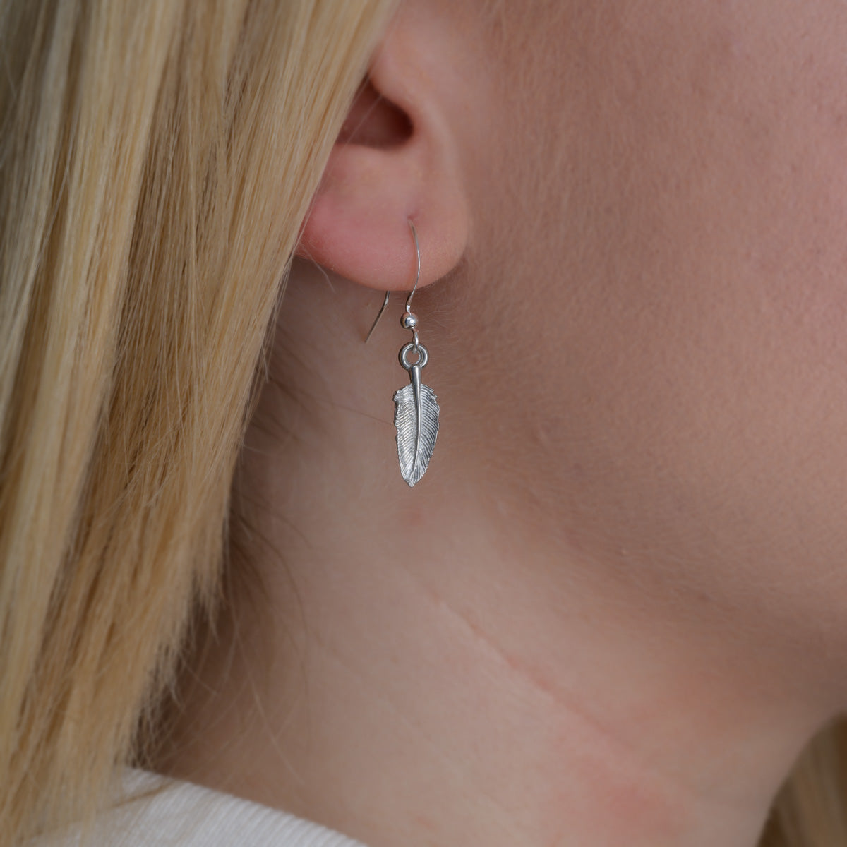 Feather drop hot sale earrings silver